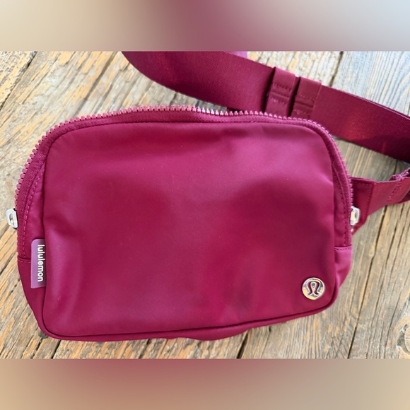 lululemon athletica Handbags - lululemon athletica Burgundy Crossbody Belt Bag 2L